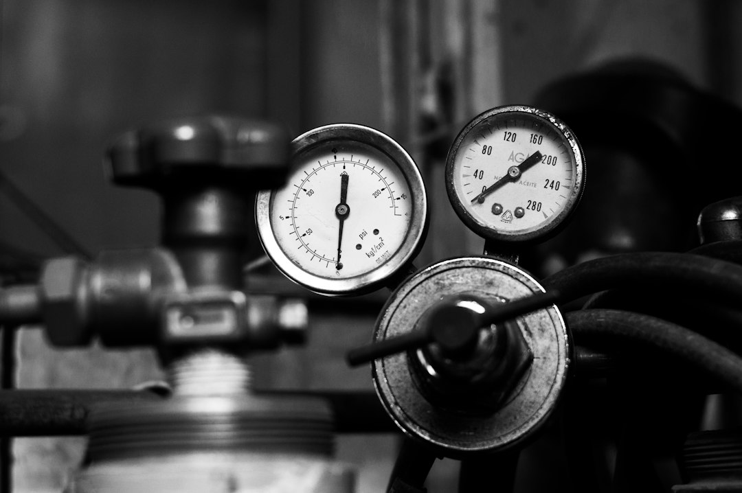 Close-up of precision gauges representing controlled sublimation coating mil thickness